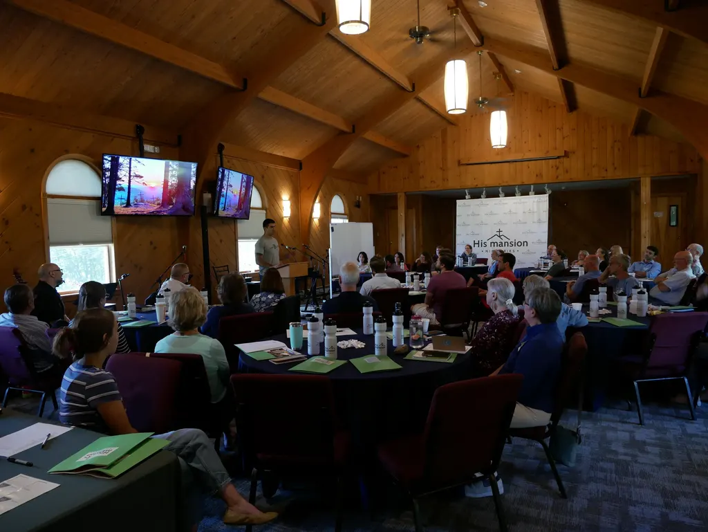 Attendees at the Counseling Conference listening to a Resident giving his testimony